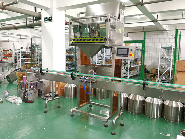顆粒定量灌裝機設(shè)備車間展示